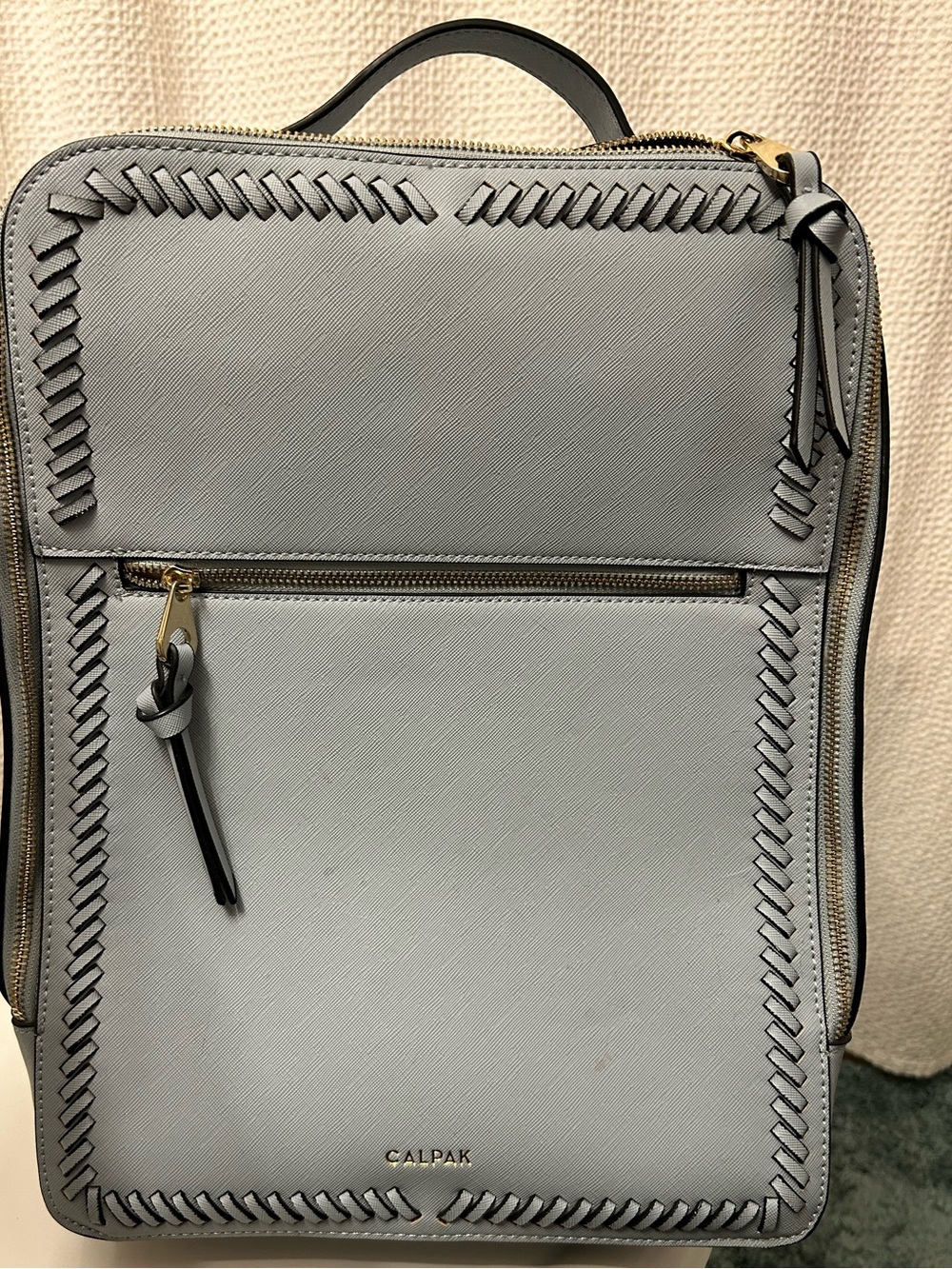 Calpak Baby Blue Backpack with Gold Trim Zipper